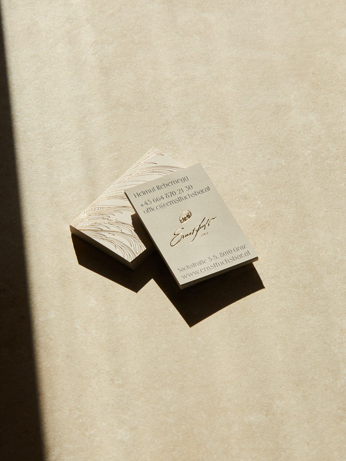 Business card design for Ernst Fuchs Bar in Graz with gold foil by Faible Creative