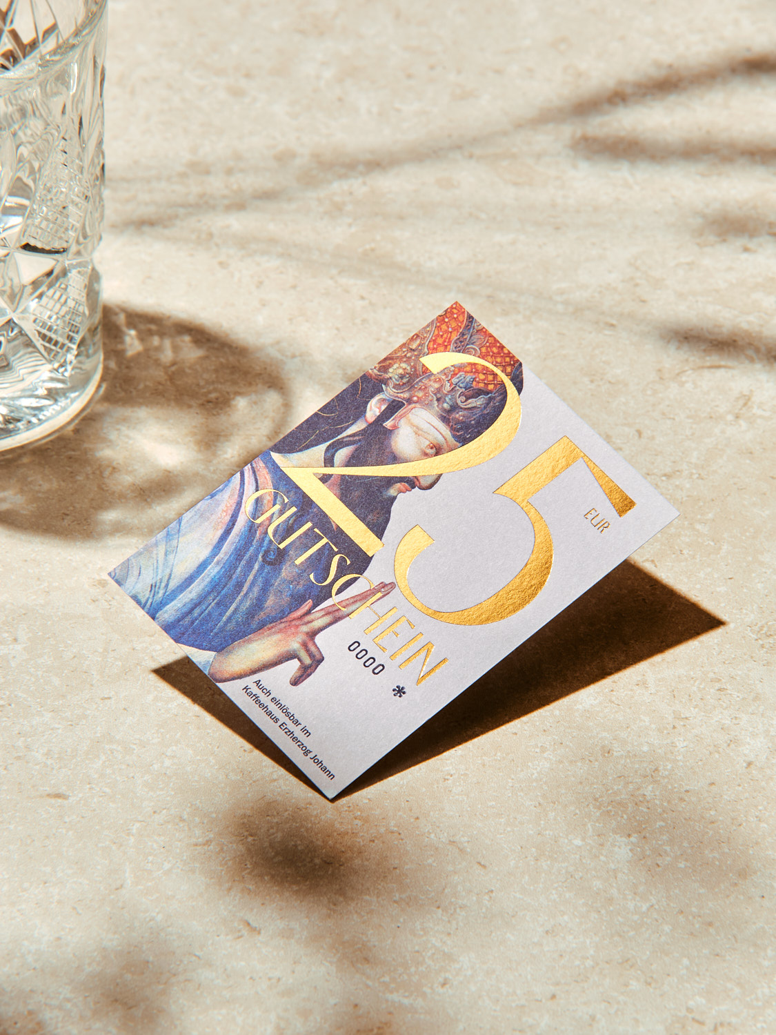 Voucher design for Ernst Fuchs Bar in Graz with gold foil detail by Faible Creative